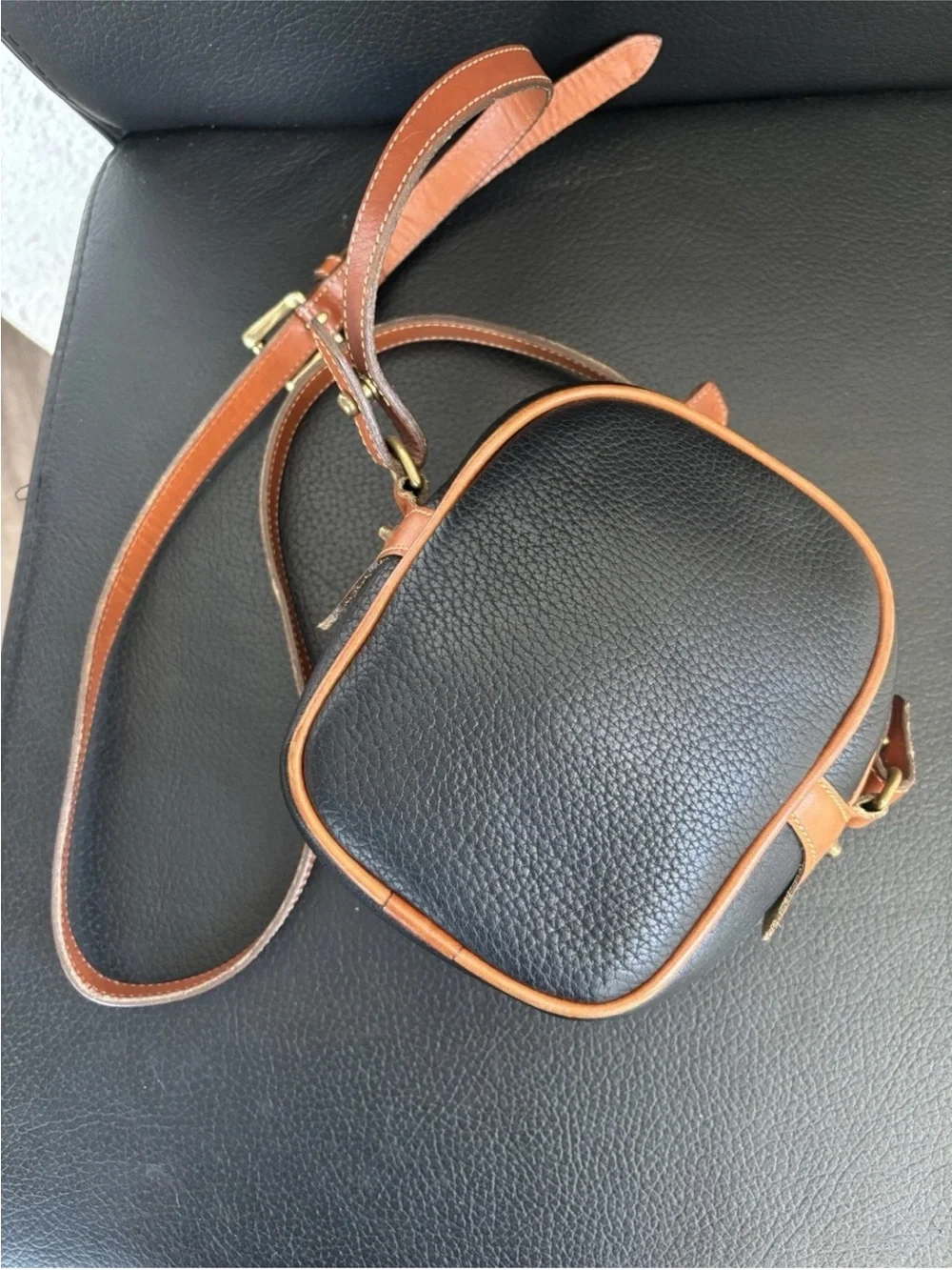 Dooney & Bourke Black Pebbled Leather Mini Crossbody with Tan Trim